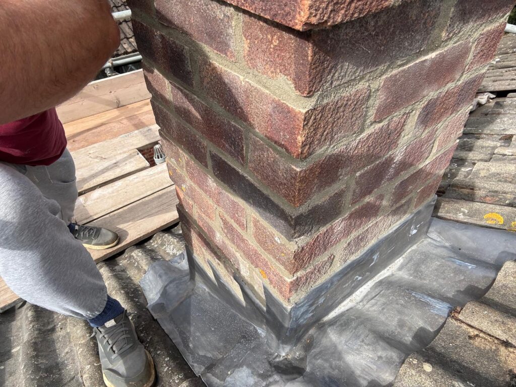Repaired chimney flashing